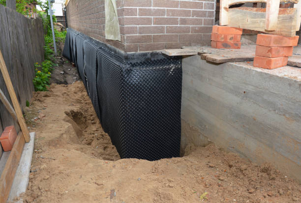 Happy homeowners after waterproofing job in Bridgeton